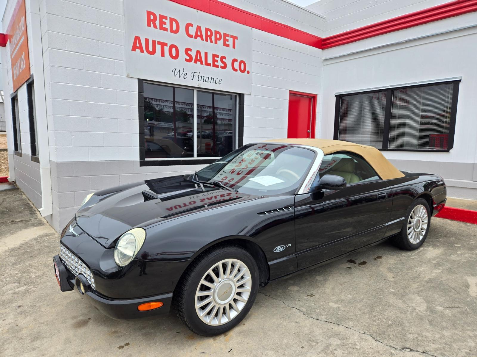 2004 Black /BEIGE Ford Thunderbird Deluxe (1FAHP60A14Y) with an 3.9L V8 DOHC 32V engine, 5-Speed Automatic Overdrive transmission, located at 503 West Court, Seguin, TX, 78155, (830) 379-3373, 29.568621, -97.969803 - 2004 Ford Thunderbird Deluxe with a 3.9L V8 DOHC 32V, Automatic, Tilt, Cruise, AM/FM/CD Stereo, Power Windows, Locks, Seat and Side Mirrors, Leather Seats, Automatic Headlights, Power Sunroof, Heated Seats, Convertible Soft Top, Alloy Wheels, Rear Defroster and more!! - Photo #0
